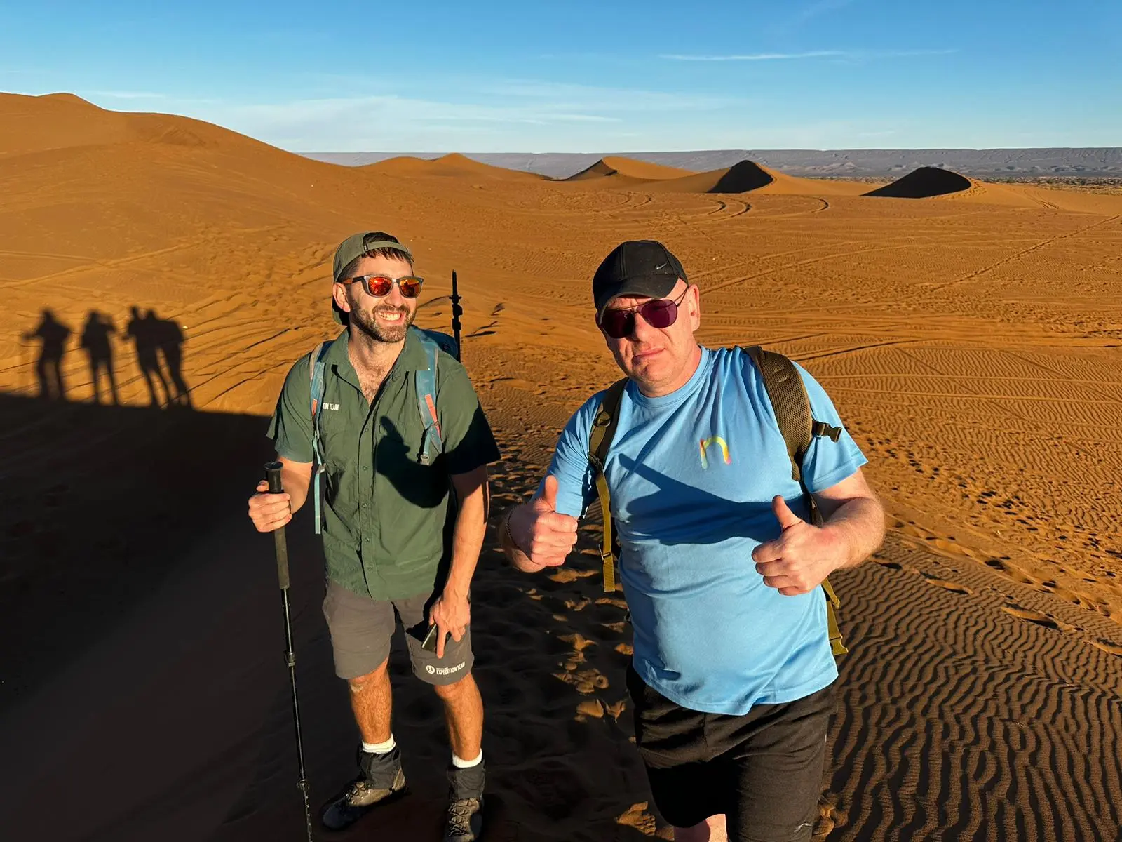 picture of the author smiling with a teammate